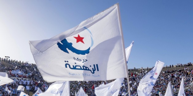 In October 18th, 2014: in the theater of Sidi Mansour, city in the suburb of Sfax, the second city of the country, more than 10 000 partisans of Ennahdha gathered for a big meeting of the Islamist party. Under a blazing sun, Rached Ghannouchi, president of the party, orchestrates an electoral meeting with presentations of both lists Ennahdha (Sfax1 and 2), talk about candidates and final speech of Ghannouchi. (Photo by Nicolas Fauqu��/Corbis via Getty Images)