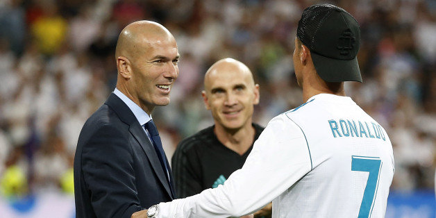 MADRID, SPAIN - AUGUST 16: Head coach Zinedine Zidane (L) and Cristiano Ronaldo of Real Madrid celebrate after the Supercopa de Espana Final second leg match between Real Madrid and FC Barcelona at Estadio Santiago Bernabeu on August 16, 2017 in Madrid, Spain. (Photo by Angel Martinez/Real Madrid via Getty Images)