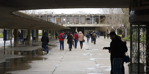 ALGIERS, ALGERIA - JANUARY 25: Students walk across campus of University of Sciences and Technology Houari Boumediene in January 25, 2015 in Algiers, Algeria. (Photo by Thomas Trutschel/Photothek via Getty Images)