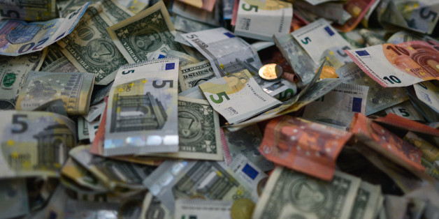 A view Euro and Dollar billets and coins, on March 20, 2017, in Dublin, Ireland. White House press secretary Sean Spicer said in his interview with the Sunday Independent: 'As much as we love Ireland... we want the US companies back'. (Photo by Artur Widak/NurPhoto via Getty Images)
