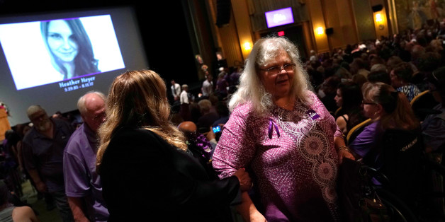 Car attack victim Heather Heyer's mother Susan Bro departs at the end of a memorial service for her daughter at the Paramount Theater in Charlottesville, Virginia, U.S. August 16, 2017. REUTERS/Jonathan Ernst