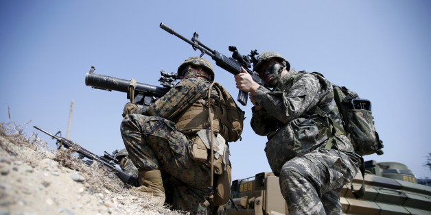 U.S. and South Korean marines participate in a U.S.-South Korea joint landing operation drill in Pohang March 30, 2015. The drill is part of the two countries' annual military training called Foal Eagle, which runs from March 2 to April 24. REUTERS/Kim Hong-Ji