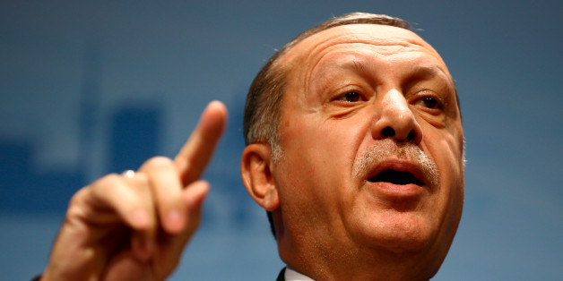 Turkish President Recep Tayyip Erdogan speaks during a news conference to present the outcome of the G20 leaders summit in Hamburg, Germany July 8, 2017. REUTERS/Wolfgang Rattay TPX IMAGES OF THE DAY