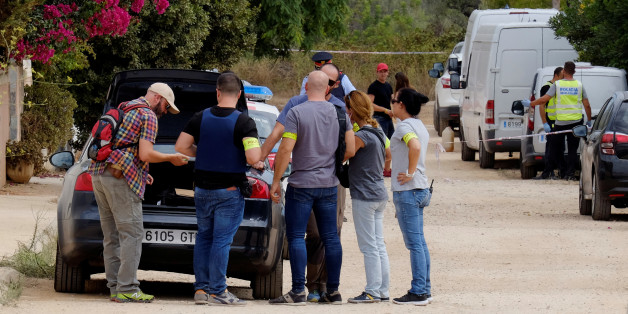 Police in plain clothes gather at the site where a house, which Barcelona attackers used to prepare the attacks, collapsed on Wednesday in Alcanar near Taragona, Spain August 20, 2017. REUTERS/Heino Kalis