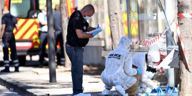 French forensic police search the site following a car crash on August 21, 2017, in the southern Mediterranean city of Marseille.
At least one person has died in Marseille after a car crashed into people waiting at two different bus stops in the southern French port city, police sources told AFP, adding that the suspected driver had been arrested afterwards. The police sources, who asked not to be identified, did not say whether the incident was being treated as a terror attack or an accident. / AFP PHOTO / boris HORVAT (Photo credit should read BORIS HORVAT/AFP/Getty Images)