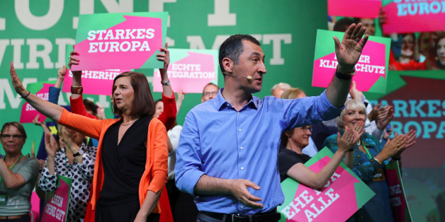 Top candidates Katrin Goering-Eckardt and Cem Oezdemir of Germany's environmental party Die Gruenen (The Greens) celebrate after a party congress in Berlin, Germany, June 18, 2017. REUTERS/Hannibal Hanschke