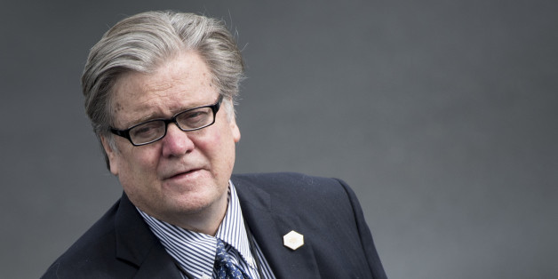 Strategist Steve Bannon waits while US President Donald Trump arrives at Lynchburg Regional Airport May 13, 2017 in Lynchburg, Virginia. / AFP PHOTO / Brendan Smialowski (Photo credit should read BRENDAN SMIALOWSKI/AFP/Getty Images)