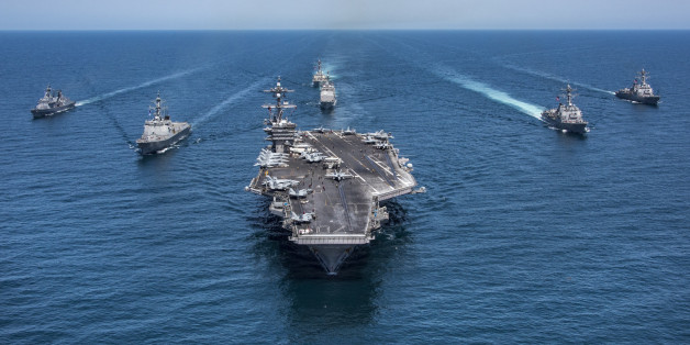 PACIFIC OCEAN - MAY 3: In this handout provided by the U.S. Navy, the Republic of Korea destroyers Sejong the Great (DDG 991) and Yang Manchun (DDH 973), the Arleigh Burke-class guided-missile destroyers USS Wayne E. Meyer (DDG 108), USS Michael Murphy (DDG 112) and USS Stethem (DDG 63), the Ticonderoga-class guided-missile cruiser USS Lake Champlain (CG 57) and the Nimitz-class aircraft carrier USS Carl Vinson (CVN 70) patrol May 3, 2017 in the western Pacific Ocean. The U.S. Navy has patrolle