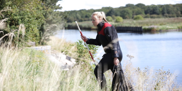 Members of The Danish Emergency Management Agency (DEMA) assist police at Kalvebod Faelled in Copenhagen on August 23, 2017 in search of missing bodyparts of journalist Kim Wall close to the site where her torso was found on, August 21. / AFP PHOTO / Scanpix Denmark / Martin Sylvest / Denmark OUT (Photo credit should read MARTIN SYLVEST/AFP/Getty Images)