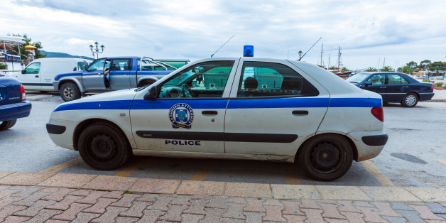 NEOS MARMARAS, GREECE - JUNE 13, 2009: Traditional police car at city center