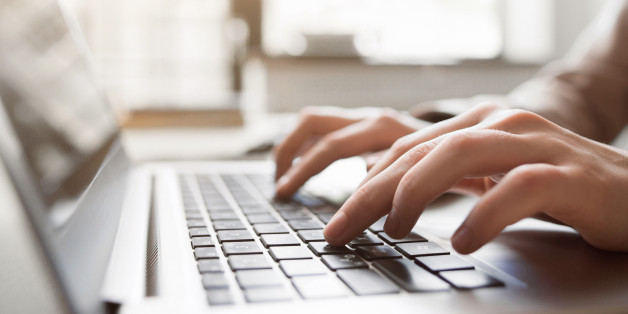 Typing on laptop closeup, chatting in Facebook, meeting website. Blogger, journalist writing new article.