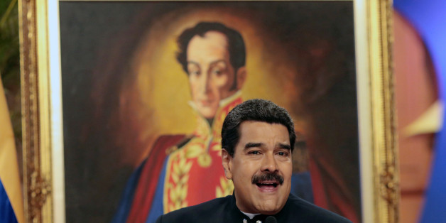 Venezuela's President Nicolas Maduro talks to the media during a news conference at Miraflores Palace in Caracas, Venezuela August 22, 2017. REUTERS/Marco Bello
