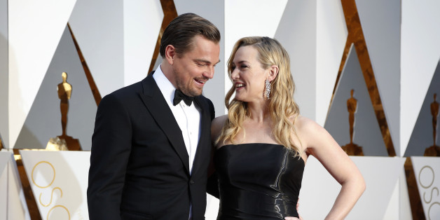 Kate Winslet, nominated for Best Supporting Actress for her role in "Steve Jobs," and Leonardo DiCaprio, nominated for Best Actor for his role in "The Revenant," arrive at the 88th Academy Awards in Hollywood, California February 28, 2016. REUTERS/Lucy Nicholson