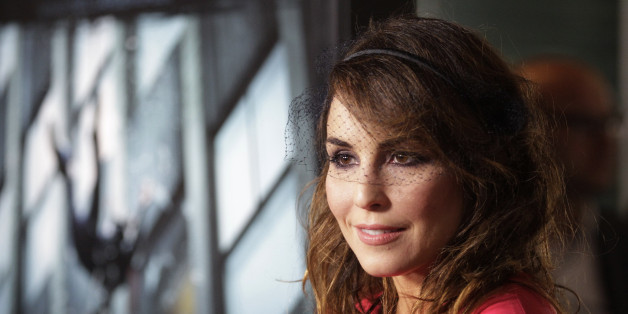 Swedish actress Noomi Rapace poses at the premiere of her new film "Dead Man Down" in Hollywood February 26, 2013. REUTERS/Fred Prouser (UNITED STATES - Tags: ENTERTAINMENT)