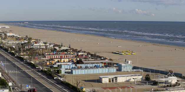 The beach is seen on the coast of Rimini April 16, 2014. Italy's beaches are a family affair - and that's a problem for the euro zone's third-largest economy. Most of the beaches along Italy's 7,500 kilometres of sun-kissed coast have for decades been managed by small businesses operating concessions that are passed on from generation to generation. Though licences are state-owned, they rarely come up for public bids, allowing Italy's balneari - or beach managers - to keep a tight grip on amenities ranging from single-shack parasol rentals to up-market bars and restaurants. To match Insight ITALY-BEACHES/ Picture taken April 16, 2014. REUTERS/Max Rossi (ITALY - Tags: TRAVEL BUSINESS ENVIRONMENT)