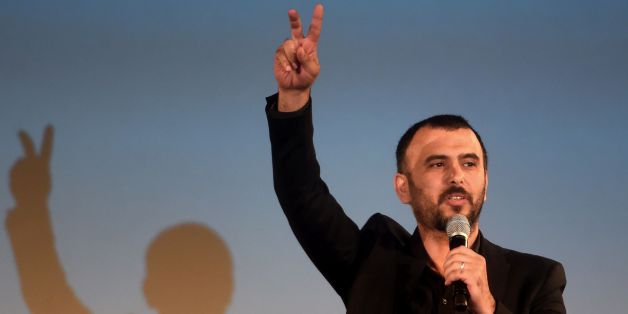 Tunisian actor Lotfi Abdelli speaks on stage during the closing ceremony of the 27th Carthage Film Festival on November 5, 2016, in the Tunisian capital Tunis. / AFP / FETHI BELAID (Photo credit should read FETHI BELAID/AFP/Getty Images)