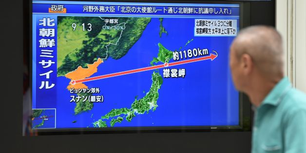 A pedestrian looks at a television screen displaying a map of Japan (R) and the Korean Peninsula in Tokyo on August 29, 2017, following a North Korean missile test that passed over Japan.Japan's Prime Minister Shinzo Abe on August 29 said North Korea's launch of a missile over its territory was an 'unprecedented, serious and grave threat' as he called for an emergency UN Security Council meeting. / AFP PHOTO / Kazuhiro NOGI (Photo credit should read KAZUHIRO NOGI/AFP/Getty Images)