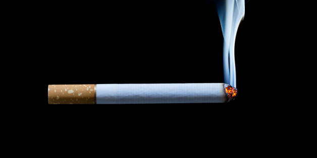 smoking cigarette on black background