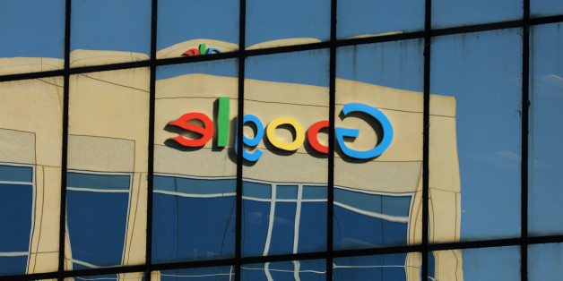 The Google logo is shown reflected on an adjacent office building in Irvine, California, U.S. August 7, 2017. REUTERS/Mike Blake
