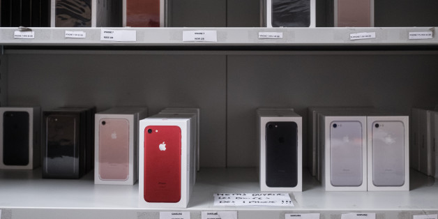 Boxes of Apple Inc. iPhone 7 smartphones sit at the storeroom inside an Orange SA mobile phone store in Blagnac near Toulouse, France, on Wednesday, July 26, 2017. Orange is looking for European acquisitions outside of telecommunications that could cost as much as several billion euros, and recently considered buying German metering company Ista International GmbH, according to people close to the matter. Photographer: Balint Porneczi/Bloomberg via Getty Images