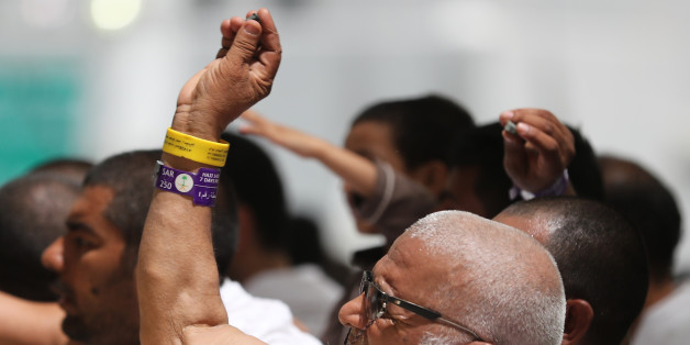 Muslim pilgrims take part in the symbolic stoning of the devil at the Jamarat Bridge in Mina, near Mecca, which marks the final major rite of the hajj on September 1, 2017.Saudi Arabia says it has deployed more than 100,000 security personnel to keep pilgrims safe this year. / AFP PHOTO / KARIM SAHIB (Photo credit should read KARIM SAHIB/AFP/Getty Images)