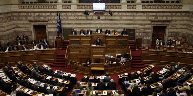 Greek Prime Minister Alexis Tsipras addresses lawmakers before a parliamentary vote on the latest round of austerity Greece has agreed with its lenders, in Athens, Greece, May 18, 2017. REUTERS/Alkis Konstantinidis