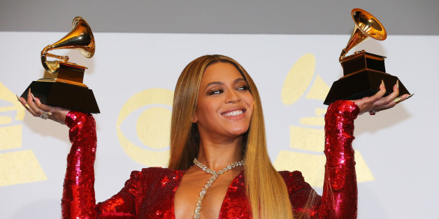 Beyonce holds the awards she won for Best Urban Contemporary Album for "Lemonade" and Best Music Video for "Formation" at the 59th Annual Grammy Awards in Los Angeles, California, U.S. , February 12, 2017. REUTERS/Mike Blake TPX IMAGES OF THE DAY