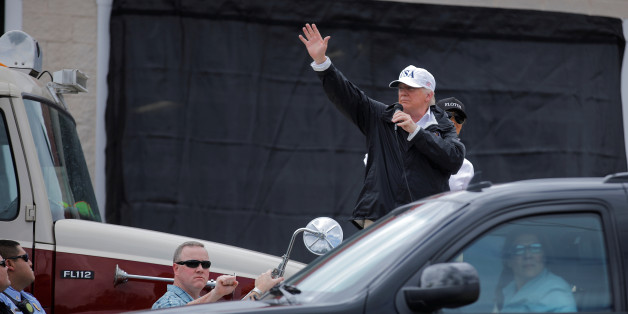 U.S. President Donald Trump waves to the crowd after receiving a briefing on Tropical Storm Harvey relief efforts at a local fire station in Corpus Christi, Texas, U.S., August 29, 2017. REUTERS/Carlos Barria