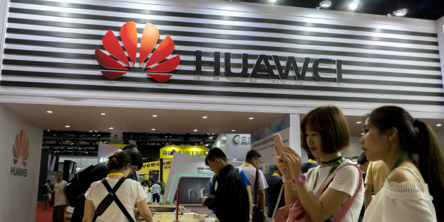 BEIJING, CHINA - 2017/07/08: Customers are trying the new Huawei smart phones. Huaweis shipment for Q2 is expected to decline compared to 32 million units shipped the same period in 2016 and has lowered its target for this year. Currently, Huawei still ranks the No.1 position in China and No.3 in global market. (Photo by Zhang Peng/LightRocket via Getty Images)