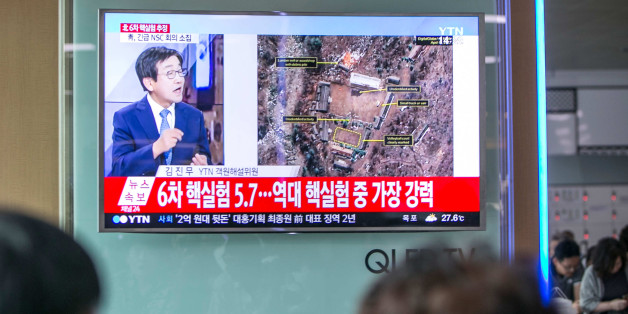 People watch a television screen showing a news broadcast on North Korea's nuclear test at Seoul Station in Seoul, South Korea, on Sunday, Sept. 3, 2017. North Korea said it successfully tested a hydrogen bomb with 'unprecedentedly big power' on Sunday that can be loaded onto an intercontinental ballistic missile, in its first nuclear test under U.S. President Donald Trump's watch. Photographer: Jean Chung/Bloomberg via Getty Images