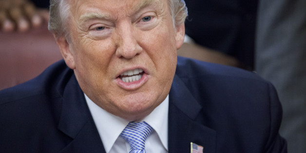 U.S. President Donald Trump speaks before signing a proclamation declaring a day of prayer in the Oval Office of the White House in Washington, D.C., U.S., on Friday, Sept. 1, 2017. Trump declared Sunday, September 3 a national day of prayer for Hurricane Harvey victims. Photographer: Andrew Harrer/Bloomberg via Getty Images
