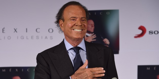 Spanish singer Julio Iglesias gestures before a press conference in Mexico city, on September 23, 2015. Iglesias is in Mexico to promote his new album 'Mexico'. AFP PHOTO/RONALDO SCHEMIDT (Photo credit should read RONALDO SCHEMIDT/AFP/Getty Images)