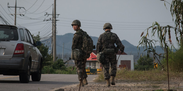 South Korean soldiers walk to a checkpoint at the Demilitarized zone (DMZ) separating North and South Korea, on Ganghwa island on September 4, 2017.
North Korea could be preparing another missile launch, Seoul said September 4 as it strengthened its defences following Pyongyang's biggest-ever nuclear test and declaration it had a hydrogen bomb. / AFP PHOTO / Ed JONES (Photo credit should read ED JONES/AFP/Getty Images)