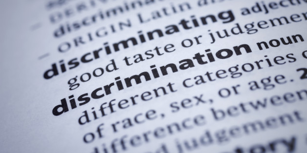 Discrimination: Dictionary Close-up. Selective focus and Canon EOS 5D Mark II with MP-E 65mm macro lens.