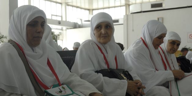 Algerian pilgrims gather at Algiers airport on August 29, 2016, for their departure to the annual Hajj pilgrimage in the Islamic holy cities of Mecca and Medina in Saudi Arabia.The Hajj, the largest annual pilgrimage in the world, is the fifth pillar of Islam, a religious duty that must be carried out at least once in the lifetime of every able-bodied Muslim who can afford to do so. / AFP / RYAD KRAMDI (Photo credit should read RYAD KRAMDI/AFP/Getty Images)