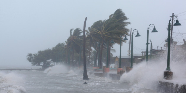 Waves crash against the seawall as Hurricane Irma slammed across islands in the northern Caribbean on Wednesday, in Fajardo, Puerto Rico September 6, 2017. REUTERS/Alvin Baez TPX IMAGES OF THE DAY