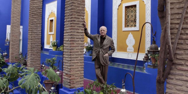 Co-founder of Yves Saint Laurent (YSL) Couture House and YSL's lifelong partner Pierre Berge poses in the Majorelle garden in Marrakesh November 26, 2010. Pierre Berge was in Marrakesh to open the "Yves Saint Laurent and Morocco" exhibition, which presents the YSL creations that have been inspired by Morocco. The exhibition, which runs till March 18, 2011, is held in the Majorelle garden owned by the Yves Saint Laurent-Pierre Berge Foundation. REUTERS/Jean Blondin (MOROCCO - Tags: FASHION SOCI