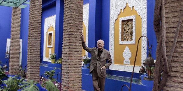 Co-founder of Yves Saint Laurent (YSL) Couture House and YSL's lifelong partner Pierre Berge poses in the Majorelle garden in Marrakesh November 26, 2010. Pierre Berge was in Marrakesh to open the "Yves Saint Laurent and Morocco" exhibition, which presents the YSL creations that have been inspired by Morocco. The exhibition, which runs till March 18, 2011, is held in the Majorelle garden owned by the Yves Saint Laurent-Pierre Berge Foundation. REUTERS/Jean Blondin (MOROCCO - Tags: FASHION SOCIETY)