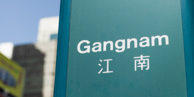 A sign for Gangnam subway station. Gangnam is a district located south of the Han River in South Korea's capital city, Seoul.