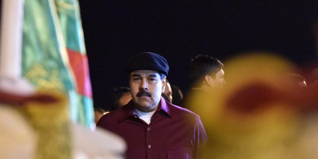 Venezuelan President Nicolas Maduro arrives at the Houari Boumedien Airport in Algiers for a two-day visit on September 10, 2017.Maduro is visiting fellow oil exporter Algeria days after announcing his country would sell crude in non-dollar currencies in a bid to resist US sanctions. / AFP PHOTO / RYAD KRAMDI / RYAD KRAMDI (Photo credit should read RYAD KRAMDI/AFP/Getty Images)