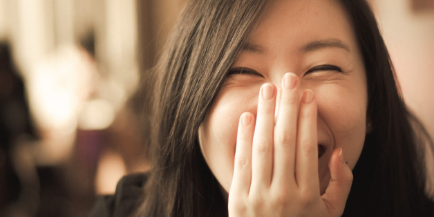 Women smile begins to spill.