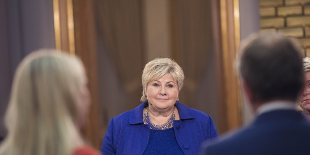 Erna Solberg, Norway's prime minister, center, attends a televised debate against Jonas Gahr Store, leader of Norway's Labor Party, not pictured, following a parliamentary election in Oslo, Norway, early on Tuesday, Sept. 12, 2017. Solberg became Norway's first Conservative Party leader in over three decades to be re-elected as voters embraced her promise of tax cuts after a first term shaped by record government spending. Photographer: Kyrre Lien/Bloomberg via Getty Images