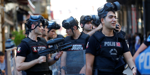 Riot police stand guard as LGBT rights activists try to gather for a pride parade, which was banned by the governorship, in central Istanbul, Turkey, June 25, 2017. REUTERS/Murad Sezer