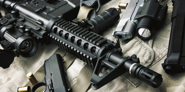 Weapons and military equipment for army, Assault rifle gun (M4A1) and pistol on camouflage background.