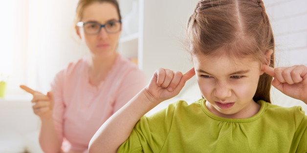 the education of the child. mother scolds her child girl. family relationships
