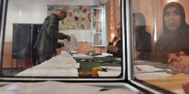 An Algerian man casts his vote at a polling station in Algiers on May 4, 2017 during parliamentary elections. Algerians voted for a new parliament amid soaring unemployment and a deep financial crisis caused by a collapse in oil revenues. / AFP PHOTO / RYAD KRAMDI (Photo credit should read RYAD KRAMDI/AFP/Getty Images)