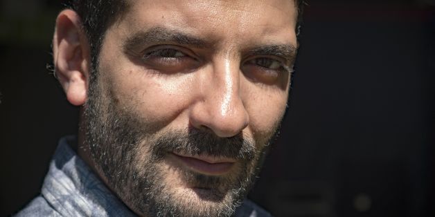 Le realisateur algerien Karim Moussaoui. AFP PHOTO / Eric CABANIS (Photo credit should read ERIC CABANIS/AFP/Getty Images)