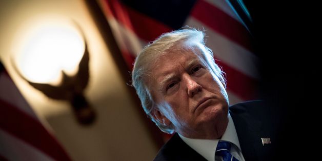 US President Donald Trump waits for a meeting with Prime Minister of Malaysia Najib Razak and others in the Cabinet Room of the White House September 12, 2017 in Washington, DC. / AFP PHOTO / Brendan Smialowski (Photo credit should read BRENDAN SMIALOWSKI/AFP/Getty Images)