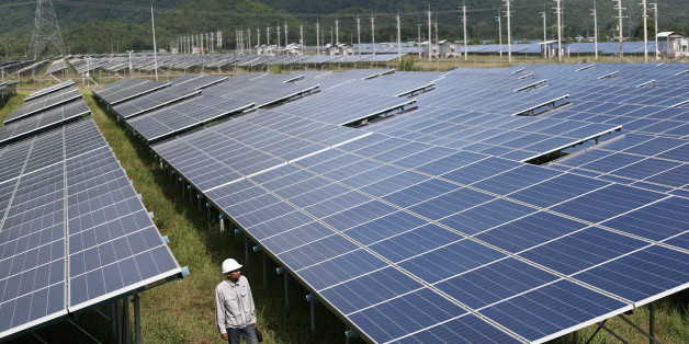 A worker walks at a solar power plant by Superblock, Southeast Asia's biggest producer of solar power in Phetchaburi province, Thailand, August 23, 2017. REUTERS/Athit Perawongmetha