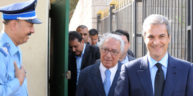 Prince Moulay Hicham (R) cousin of Morocco's King Mohammed VI , is accompanied by his lawyer Abderrahim Berrada (L) as they leave the court in Casablanca, on September 17, 2012, after the postponement of the trial for defamation against against an MP. AFP PHOTO/ABDELHAK SENNA (Photo credit should read ABDELHAK SENNA/AFP/GettyImages)